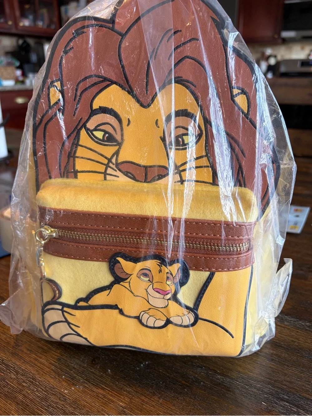 Loungefly Lion King Simba Yellow and Brown Mini Backpack
